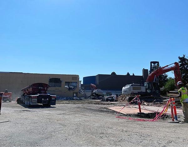 construction equipment in front of a building